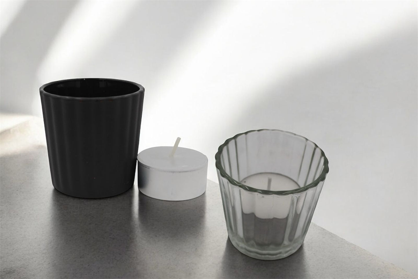 Vela tea light en vaso votivo de cristal