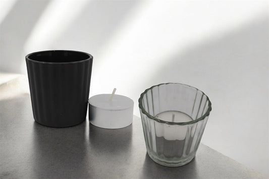 Vela tea light en vaso votivo de cristal