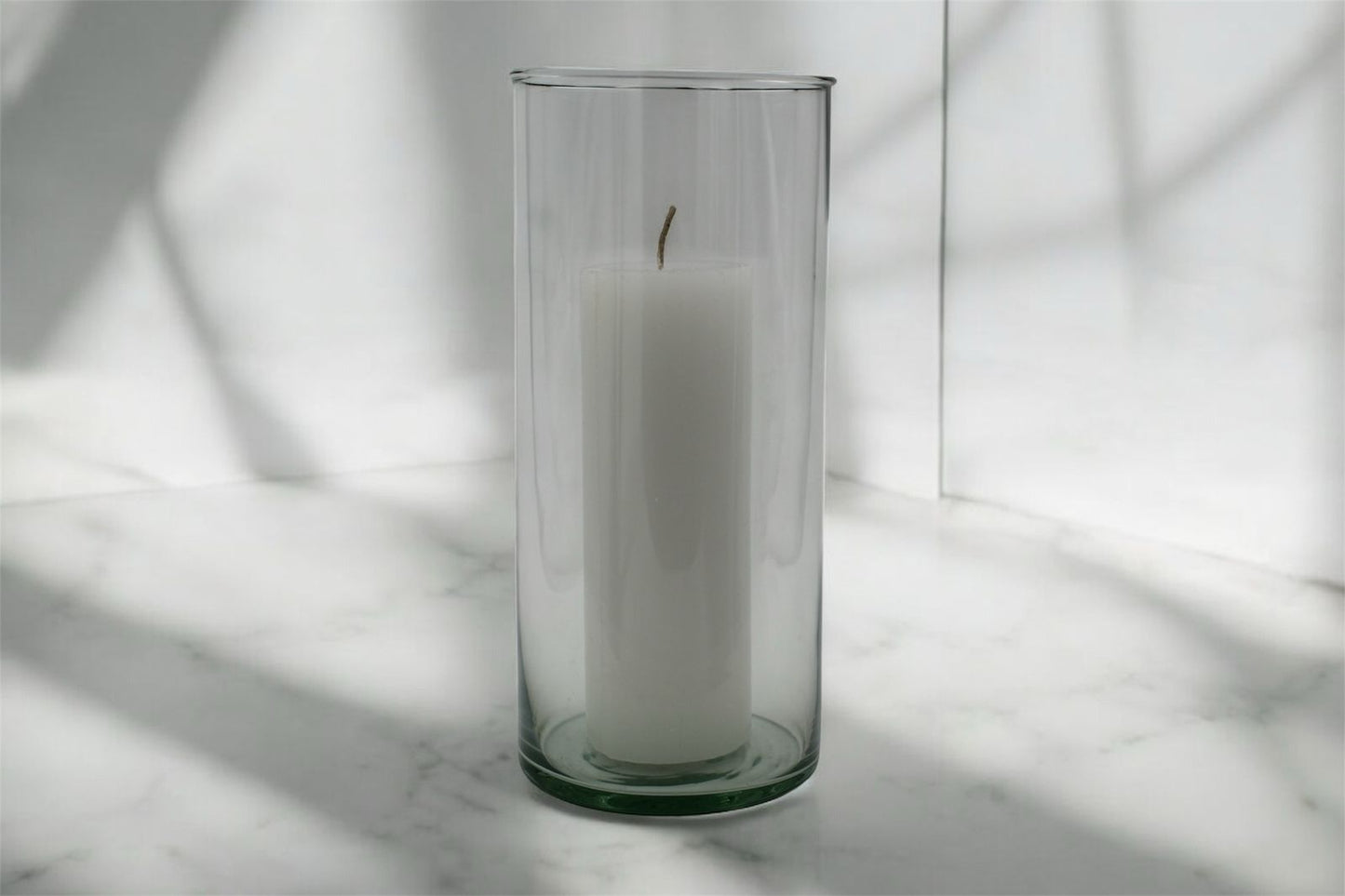 Cirio Blanco en cilindro de Cristal 3.5x8 pulgadas