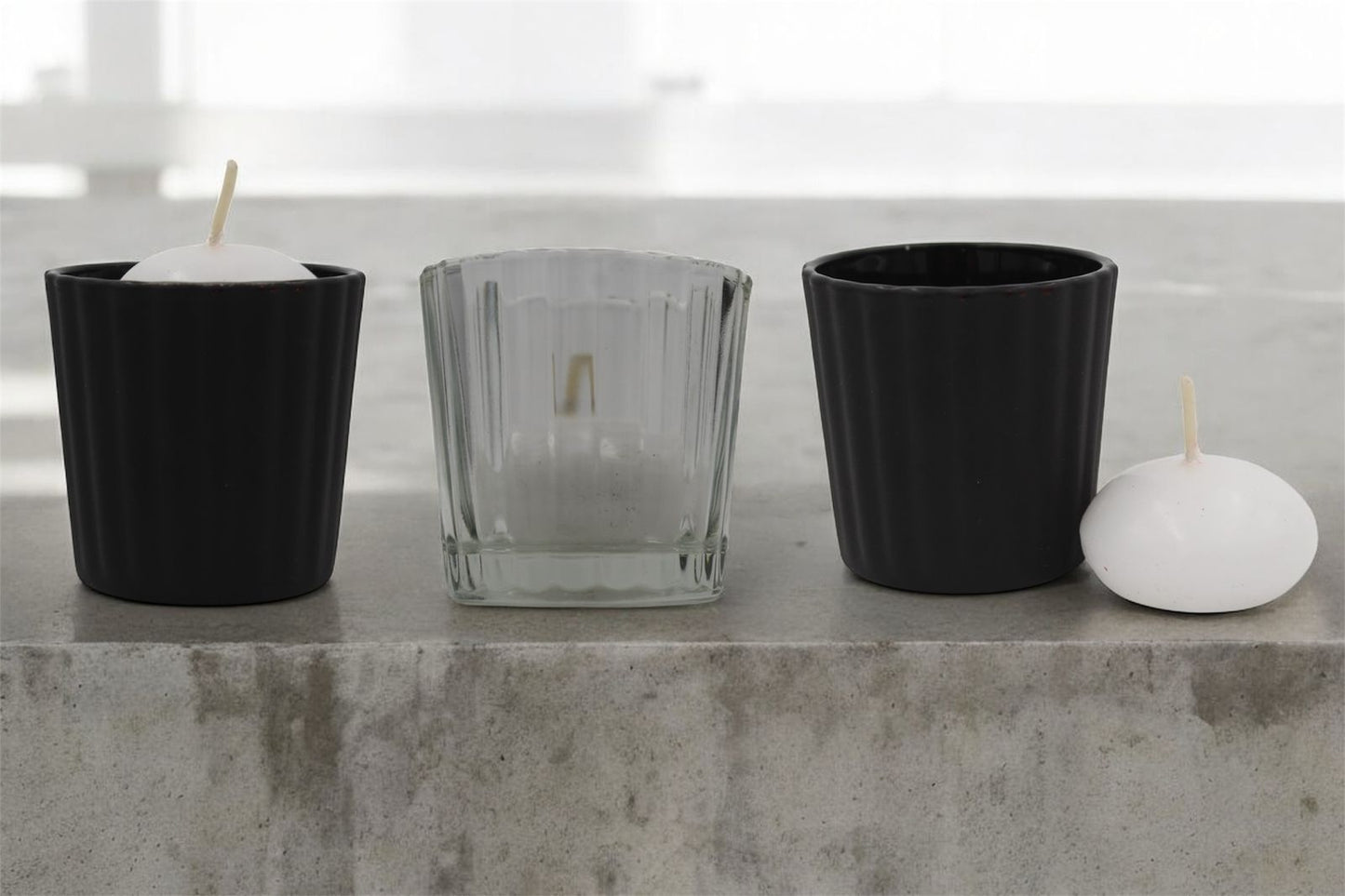 Vela flotante en vaso estriado