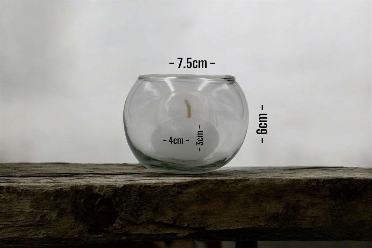 Velas en peceras de cristal