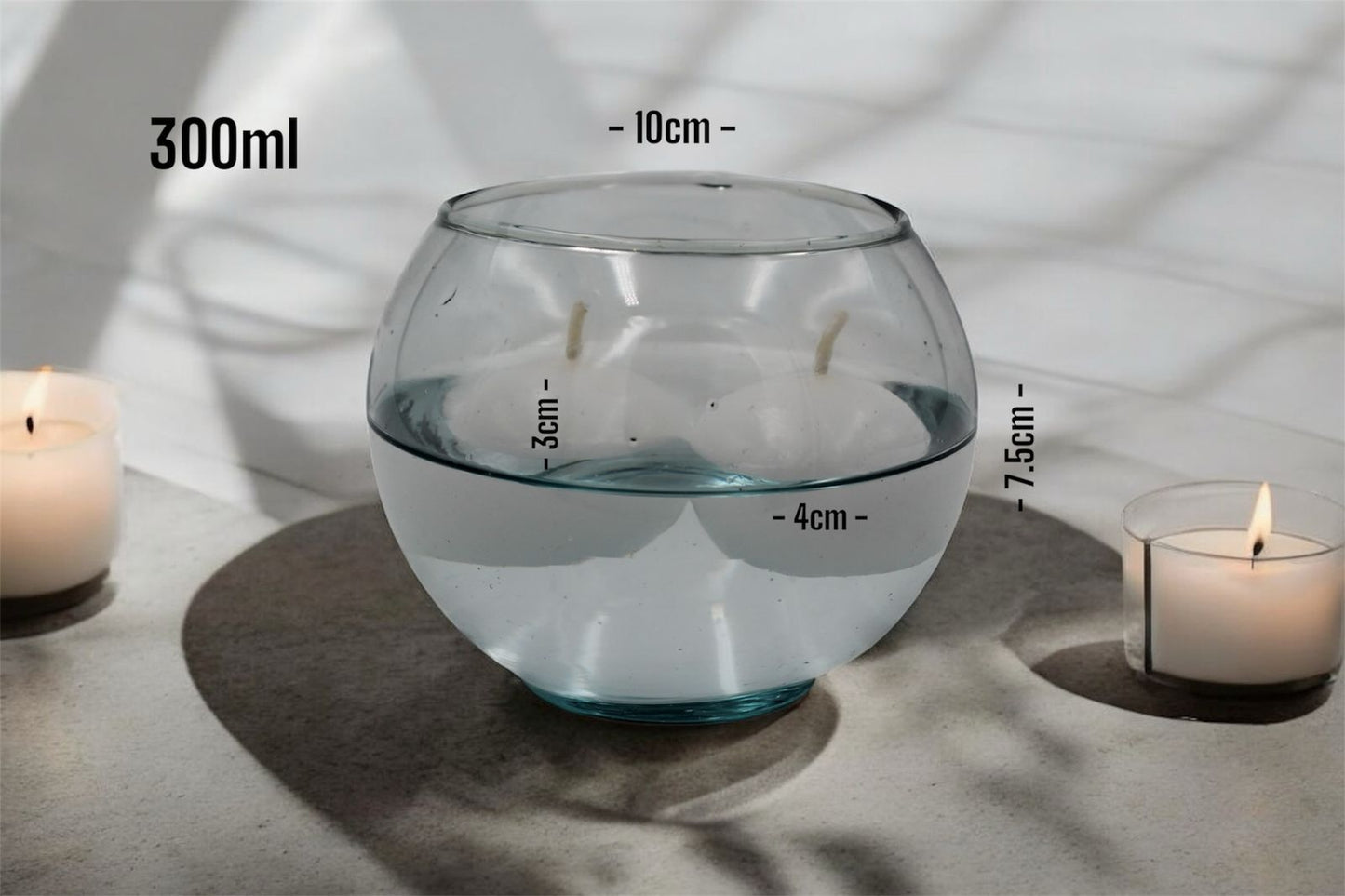 Velas en peceras de cristal