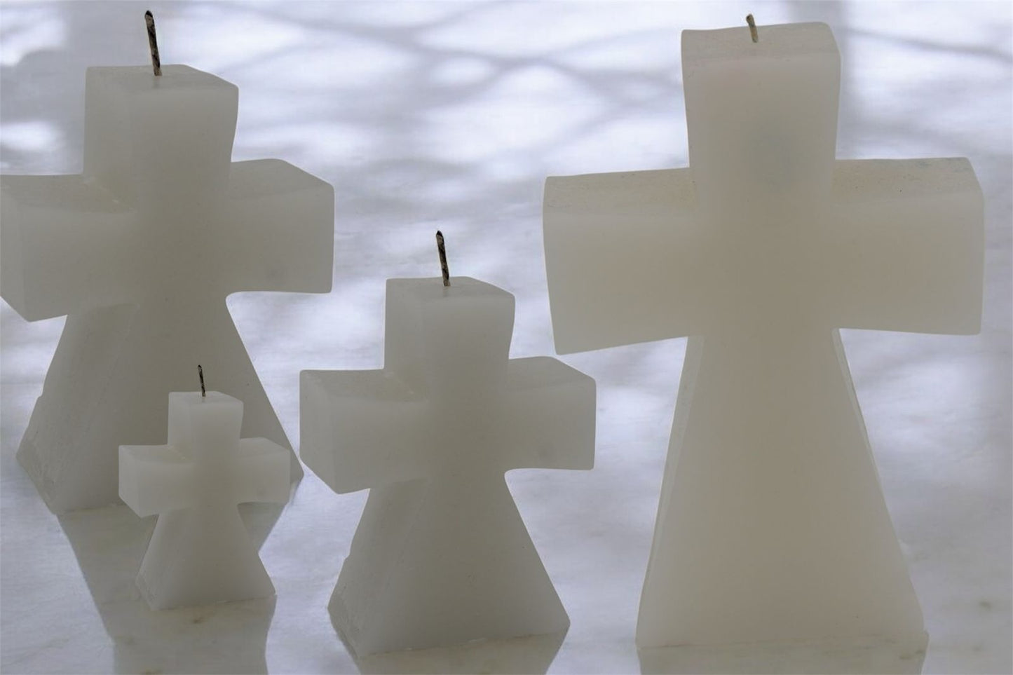 Velas en forma de cruz