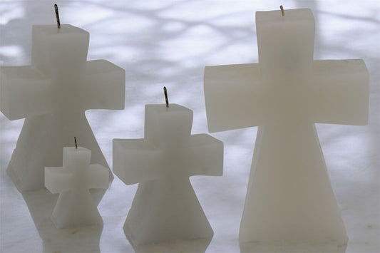 Velas en forma de cruz